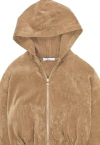 Felpa con zip marrone realizzata in morbido tessuto testurizzato, con cappuccio, vita elastica e due tasche frontali. Dettaglio della zip dorata.