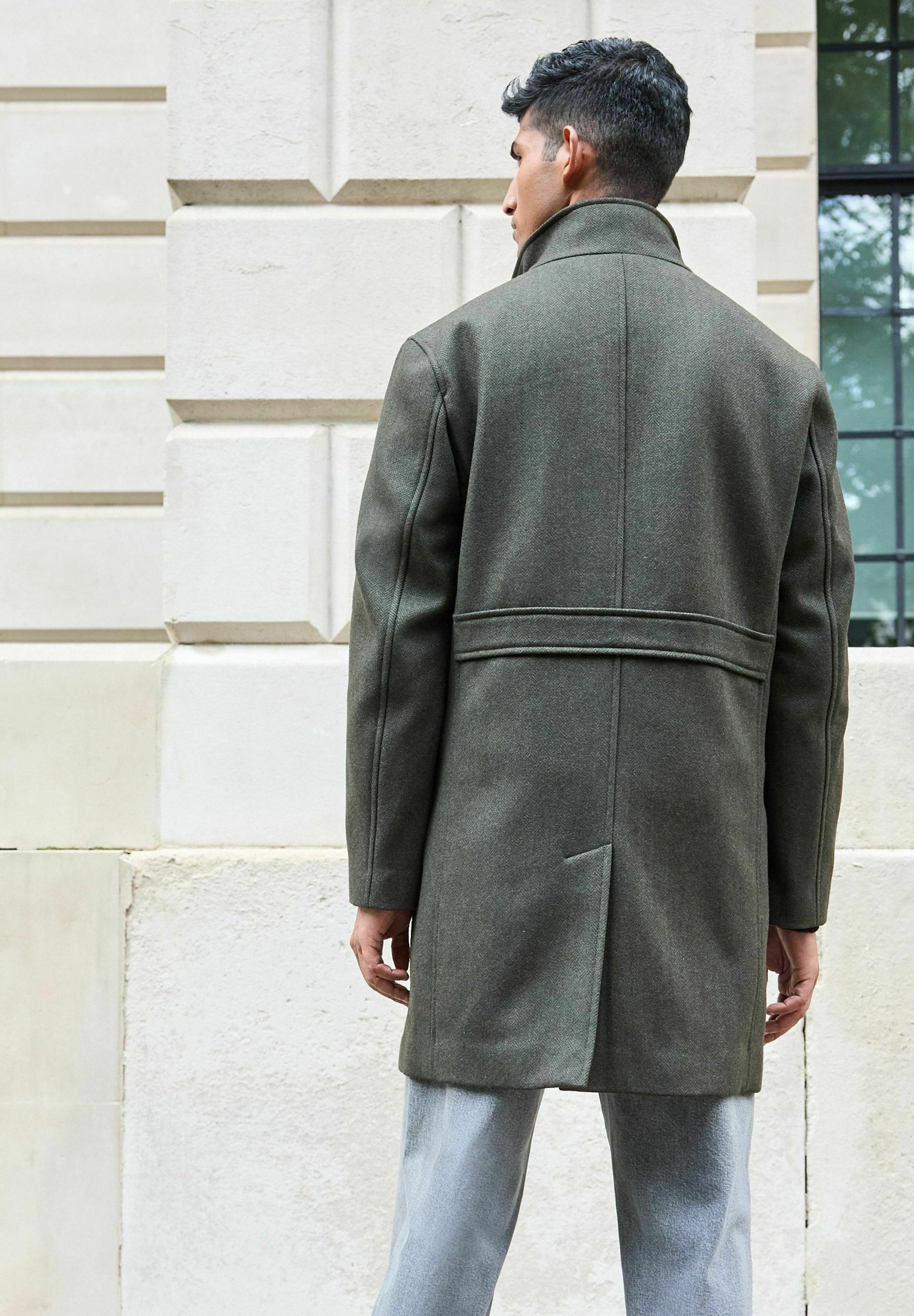 next green coat
