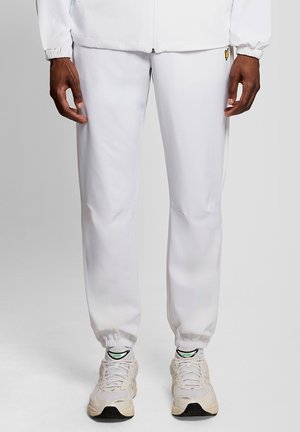 STRIPED TRACKIES - Trainingsbroek - white