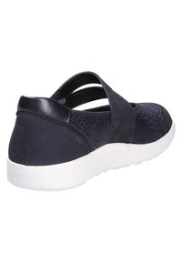 Navy slip-on shoe with textured uppers, multiple straps, and a white rubber sole for traction and comfort.