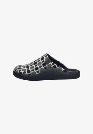 Black and white patterned slip-on shoe with a soft fabric upper, rubber sole, and textured surface. Curved silhouette with a wide opening.