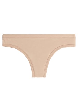 Nude cotton thong with a soft texture, narrow waistband, and seamless edges for comfort. Classic brief cut with no visible hardware.