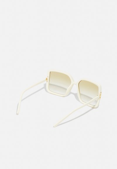 Tory Burch Saulesbrilles - ivory/light brown