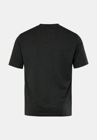 Camiseta de algodón negra de manga corta, con cuello redondo y un corte holgado. La parte trasera es lisa, sin logotipos ni patrones visibles.