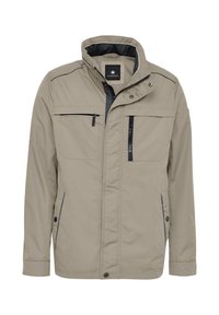 Light beige jacket with a high collar, zippered chest and side pockets, and contrasting dark accents along seams. Water-resistant material.