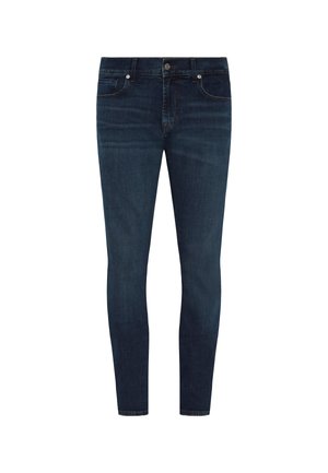 Jeans skinny in denim blu scuro. Presentano cinque tasche, una chiusura con bottone e dettagli di cucitura sottili lungo le cuciture.