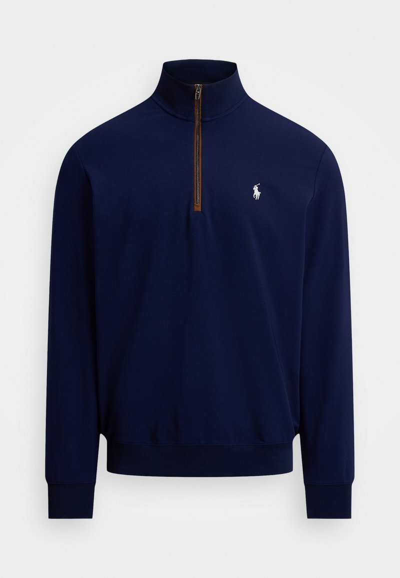 Pull-over à manches longues bleu marine avec fermeture éclair quart et logo brodé en blanc représentant un cheval et un cavalier sur la poitrine gauche.