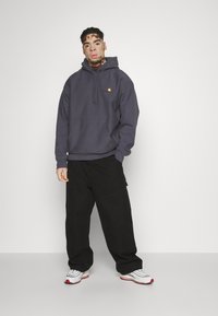 Carhartt WIP HOODED AMERICAN SCRIPT - Mikina s kapucňou - zeus