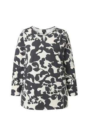 Top s dlouhým rukávem v černobílém abstraktním květinovém vzoru, s kulatým výstřihem a průstřihem na krku.