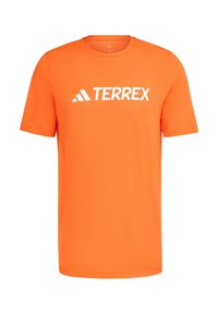 Short-sleeve orange athletic t-shirt made of synthetic material, featuring a white "TERREX" logo across the chest.