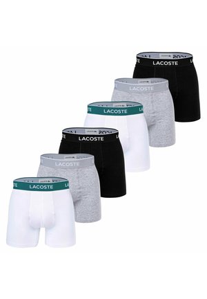 Set di boxer da uomo disponibile nei colori nero, grigio e bianco con elastico in vita stampato con logo. Materiale in cotone con una texture liscia.