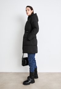 Calvin Klein Jeans CHUNKY COMBAT CHELSEA - Platåstövlar - triple black