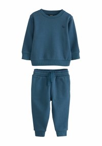 Mørkeblåt bomulds sweatshirtsæt med matchende joggers, der har ribbet krave, manchetter og talje. Diskret logo detalje på toppen.