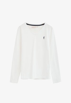 Biała koszula z długim rękawem i dekoltem w serek, z małym granatowym logo gracza polo na lewej piersi oraz metką Polo Club wewnątrz kołnierza.