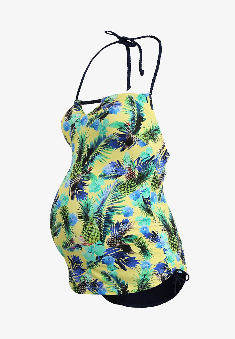 Maternity swimsuit in yellow with green and blue tropical print. Features adjustable straps and side ruching for a fitted look.