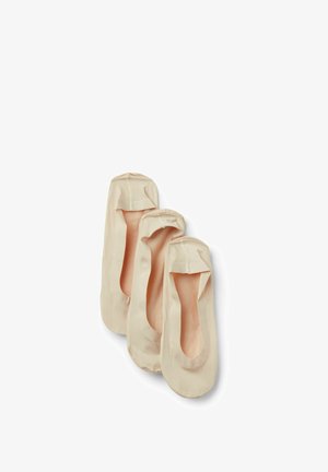 Ballet flats in soft beige fabric with a smooth texture, featuring a rounded toe and elasticized opening for secure fit. Three pairs stacked.