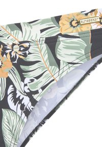 Schwarze Bikini-Hose mit einem tropischen Blumenmuster in Grün, Orange und Weiß. Hergestellt aus elastischem Material und mit einem Etikett "sunseeker".