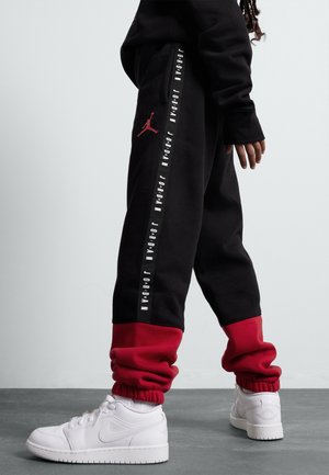 SIDELINE PANT - Trainingsbroek - black/gym red