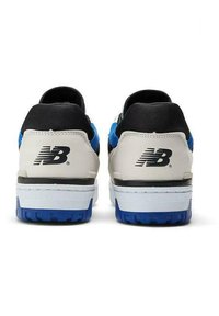 White and black sneakers with blue accents, leather and mesh upper, rubber sole, prominent 'NB' logo on heel, low-top design.