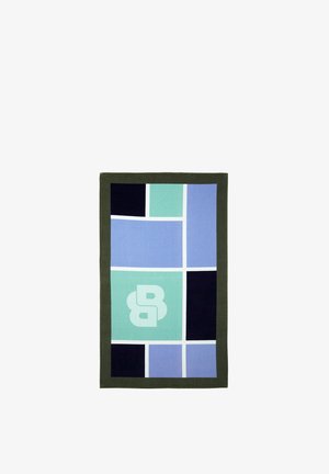 Rectangular textile with green border, divided into geometric blocks in shades of blue, green, and black, featuring a stylized double "B" in the center.