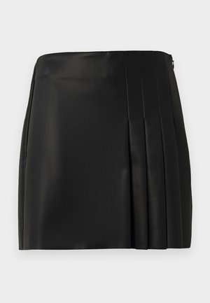 Black faux leather mini skirt with a smooth front and pleated detail on the right side, featuring a back zipper closure.