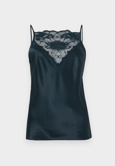 Szatén camisole sötétkék színben, csipkés panellel a nyakkivágásnál, állítható vékony pántokkal és sima textúrával.