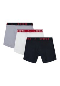 Három darabos boxer alsónadrág szett szürke, fehér és tengerészkék színben. Anyaga puha, rugalmas derékpánttal rendelkezik, amelyen piros "JORDAN" felirat található.