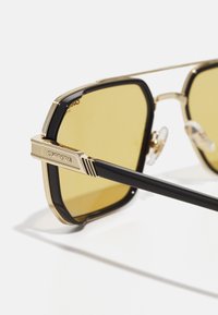 Carrera Ochelari de soare - black/yellow