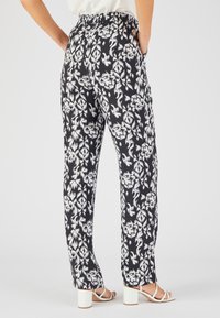 Damart Broek - noir graphique