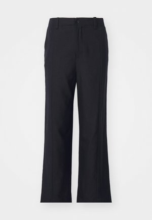 Feng Chen Wang DECONSTRUCTED PATCHWORK TROUSERS UNISEX - Trousers - black