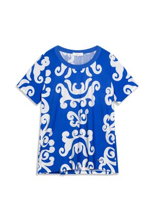 Haut bleu à manches courtes avec un motif blanc tourbillonnant, col rond et coupe ample. Tissu lisse avec une légère brillance.