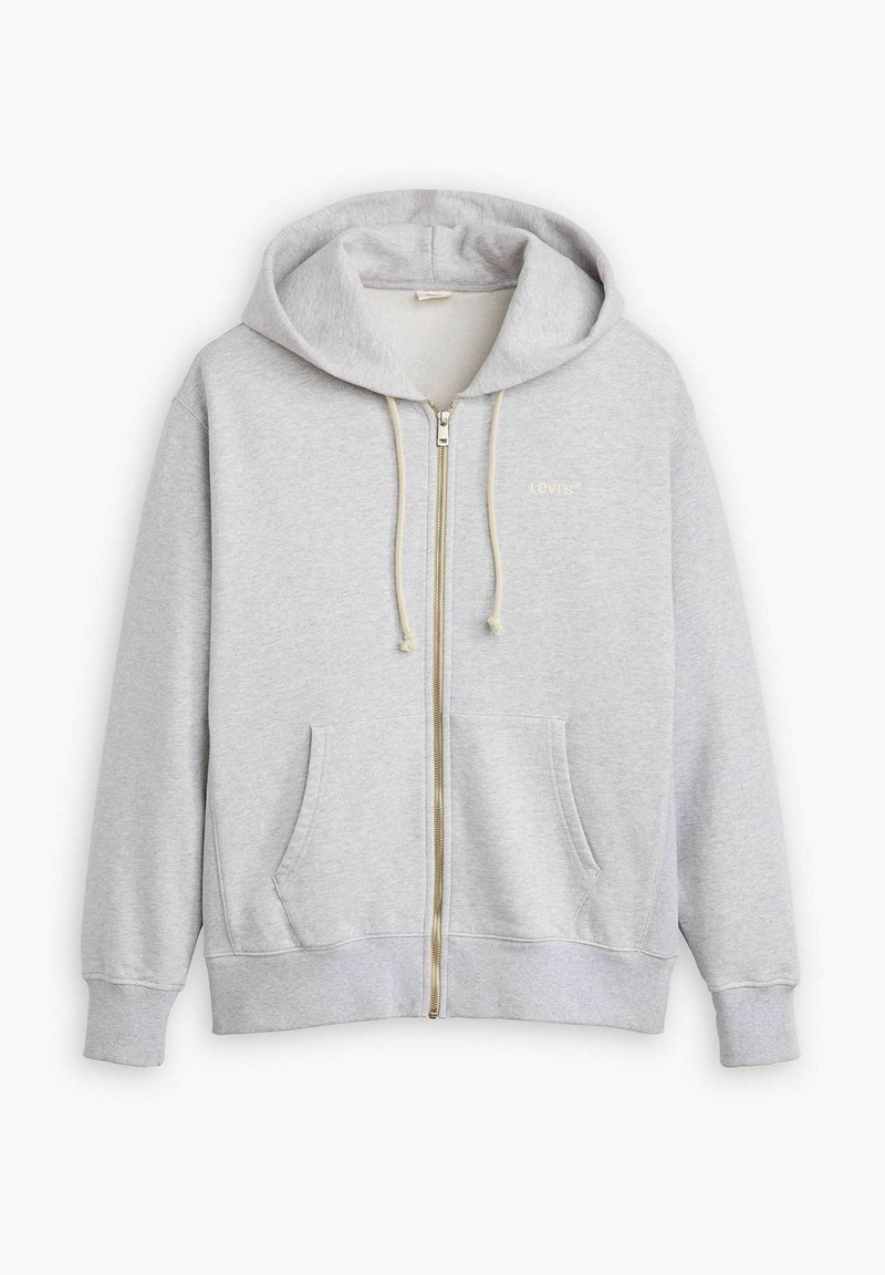 Felpa grigia con zip realizzata in misto cotone, con una texture morbida, con cappuccio, coulisse, tasche anteriori e un dettaglio logo sottile.