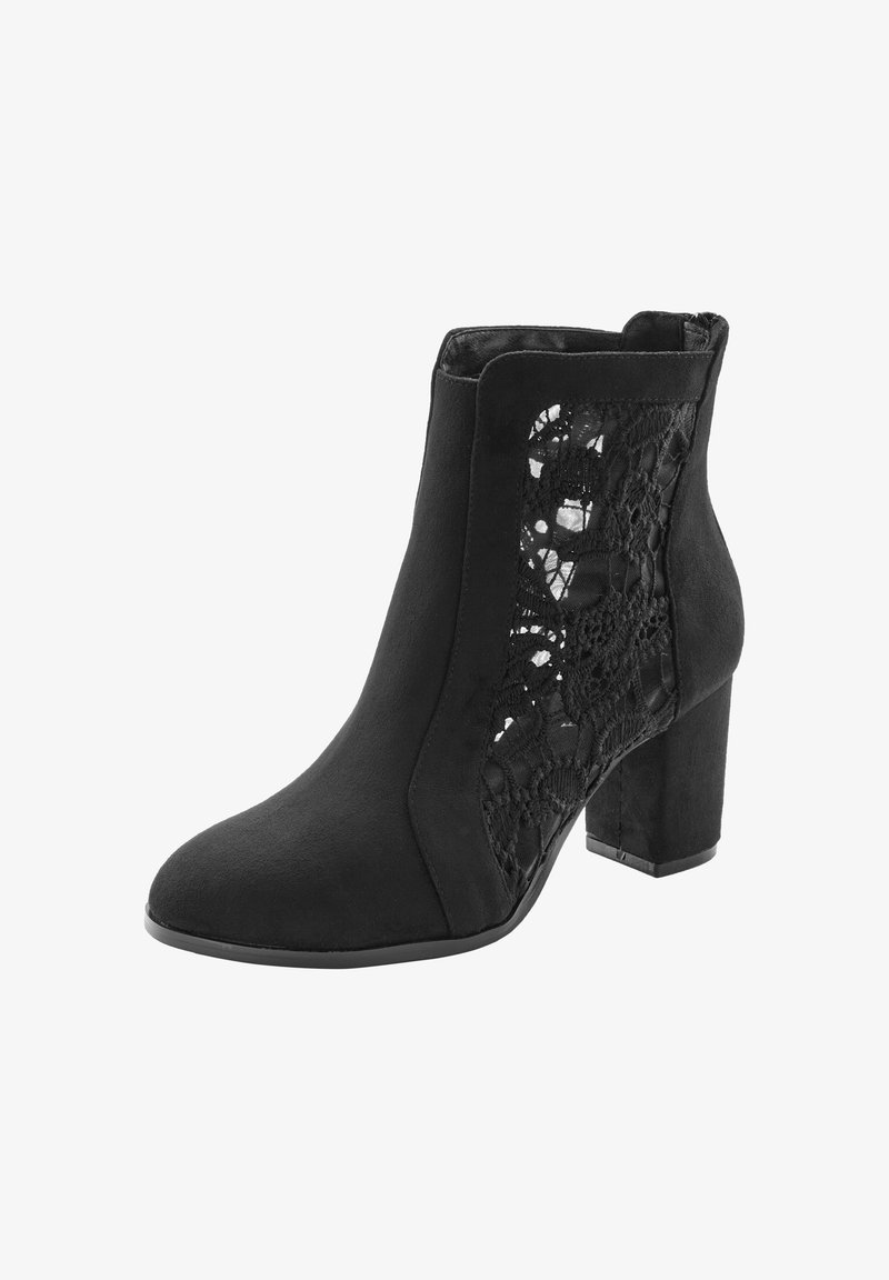 Black ankle boots with a textured suede finish, featuring lace cutouts on the sides and a chunky heel for stability.