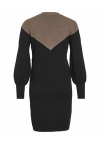 Robe en tricot noire avec une partie supérieure marron arborant un design en V ; manches longues bouffantes et poignets côtelés.