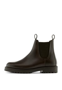 Dunkelbrauner Chelsea-Stiefel aus Leder mit elastischen Seitenteilen, Zuglaschen vorne und hinten sowie einer dicken Profilsohle.