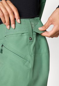 Norrøna LOFOTEN PANTS - Suusapüksid - dark ivy