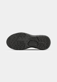 Black shoe sole with a textured rubber surface, featuring diamond and hexagonal patterns, and labeled "VR30CUSH."