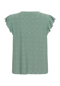 Top mint verde a maniche corte con dettagli arricciati, caratterizzato da un motivo tessile di ghirigori ricamati e piccoli dettagli a occhio di pernice.