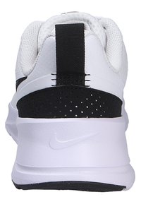 White athletic shoe with a textured mesh upper, black heel accent, perforated detailing, and a cushioned white midsole.