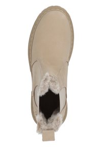 Botas de tobillo beige con un upper de ante suave, suave forro de piel sintética, puntera redondeada y una tira en la parte posterior para facilitar su colocación.