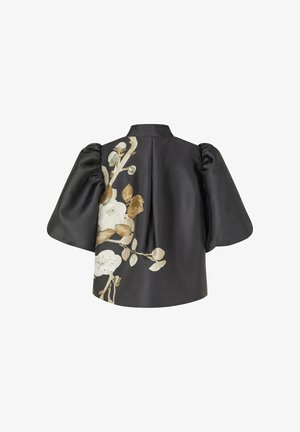 Svart satinblus med puffärmar, med en blommönstring i kräm- och jordtoner på ryggen. Skräddarsydd krage, avslappnad passform.