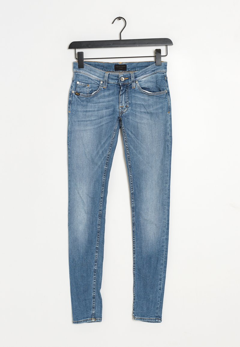 Blå denim skinny jeans med en urtvättad look, fem fickor och subtila sömnadsdetaljer. Tyget har en jämn textur och lätt stretch.