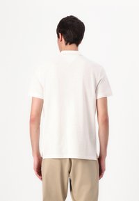 Tommy Hilfiger SLUB  - Polo - ivory petal/white