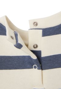 Gestreiftes Hemd in Creme- und Marinefarben, mit Druckknopfverschluss und geripptem Kragen. Weiches Baumwollmaterial mit glatter Textur.