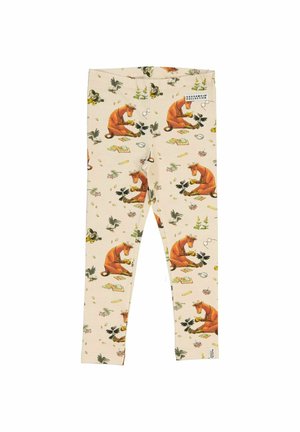Leggings lavet af blødt stof med et dyreprint med brune køer blandt blade og genstande på en lys beige baggrund.