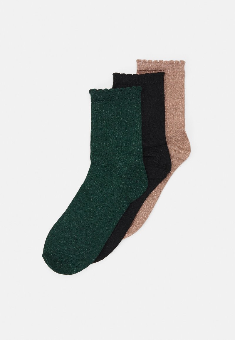 Tre par ankelstrømper: mørkegrøn, sort og en lysebrun med subtil glans. Bølgeformet manchet design på hver strømpe.