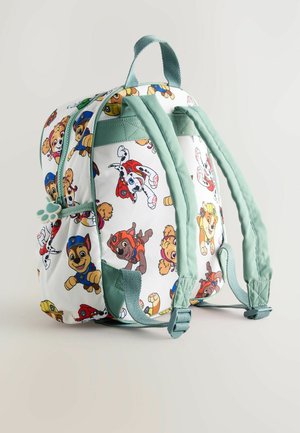 Backpack featuring colorful cartoon dog characters on a white background, with light green straps and accents, made of fabric material.