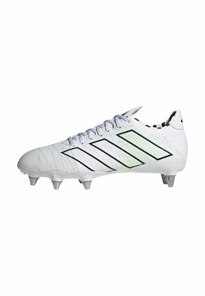 Botines de fútbol blancos con acentos multicolores, presentan una parte superior texturizada, cinco tachuelas metálicas y un diseño con cordones. Detalles en negro y verde neón.