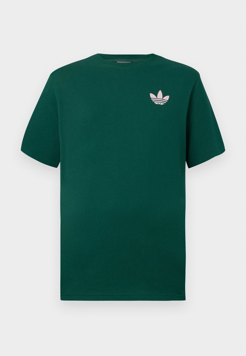 Groene katoenen T-shirt met een ronde hals, korte mouwen en een klein roze logo op de linkerborst. Glad materiaal met een losse pasvorm.