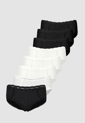 Pack of underwear featuring three black and four white pairs, with lace trim, polka dot patterns, and bows at the waistband.
